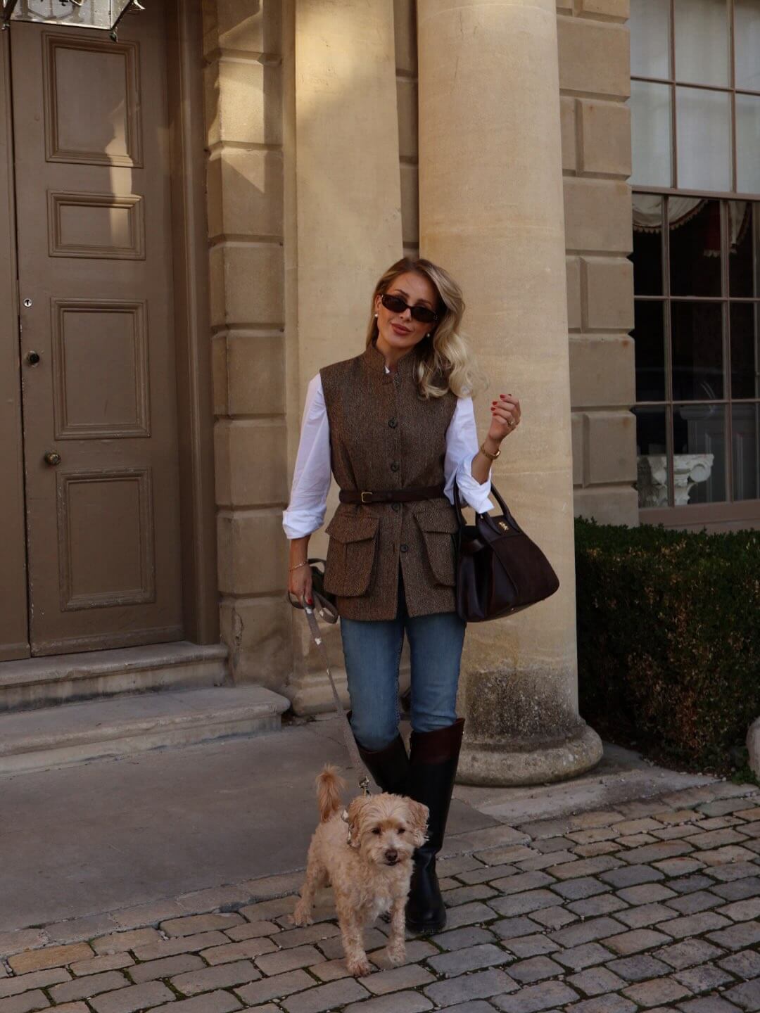 Chloe Rose with her dog Bailey wearing the Willow & Woof sheep tweed walking set, lead, collar and sailor bow