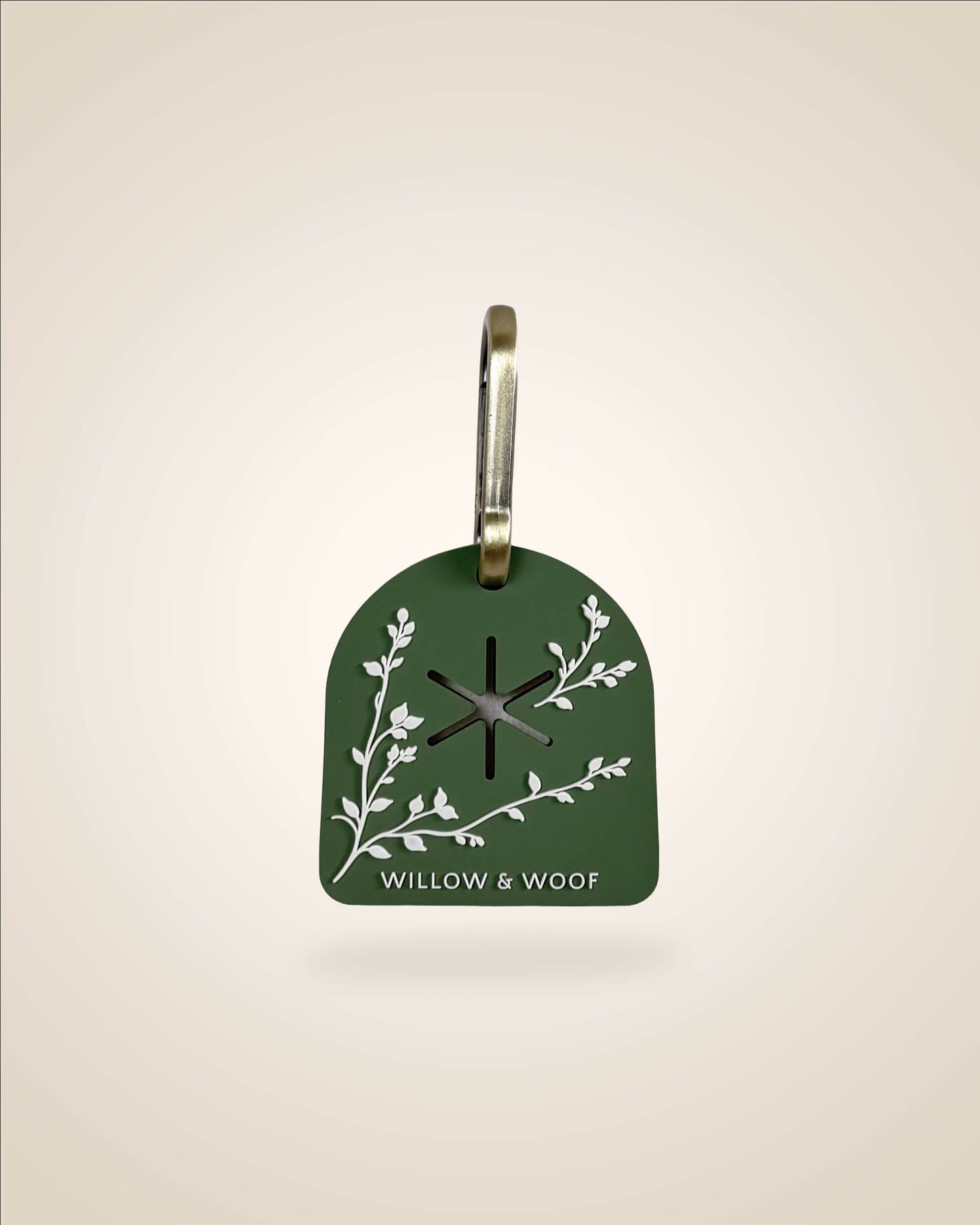 Green dog waste/poop bag carrier, white botanical flowers with bronze tone hardware